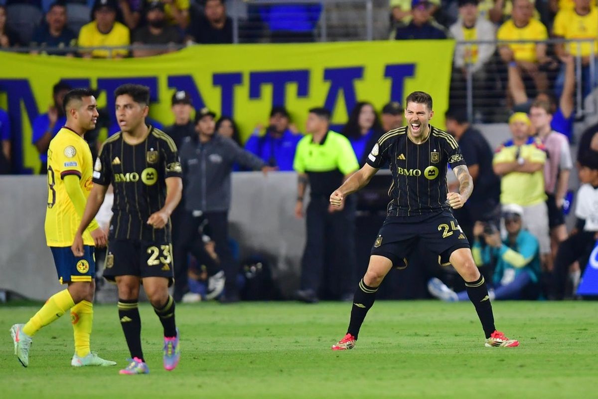 May 31, 2025; Los Angeles, California, USA; LAFC midfielder Ryan Hollingshead (24) celebrates defeating Club America in extra time during a playoff match of the 2025 FIFA Club World Cup at BMO Stadium. Mandatory Credit: Gary A. Vasquez-Imagn Images