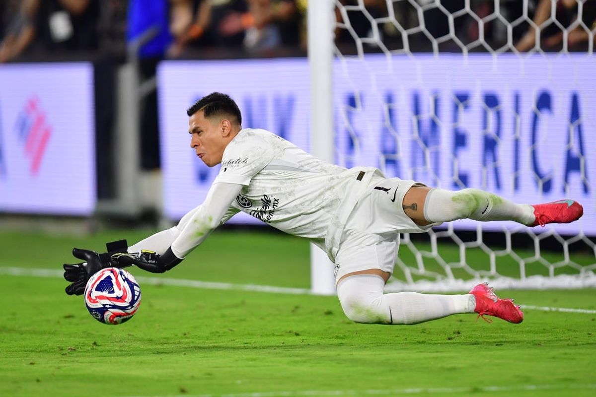 May 31, 2025; Los Angeles, California, USA; Club America goalkeeper Luis Malagon (1) blocks a shot in extra time against LAFC during a playoff match of the 2025 FIFA Club World Cup at BMO Stadium. Mandatory Credit: Gary A. Vasquez-Imagn Images