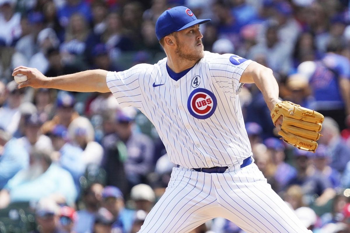 Jun 1, 2025; Chicago, Illinois, USA; Chicago Cubs pitcher Jameson Taillon (50) throws the ball against the Cincinnati Reds during the first inning at Wrigley Field. Mandatory Credit: David Banks-Imagn Images