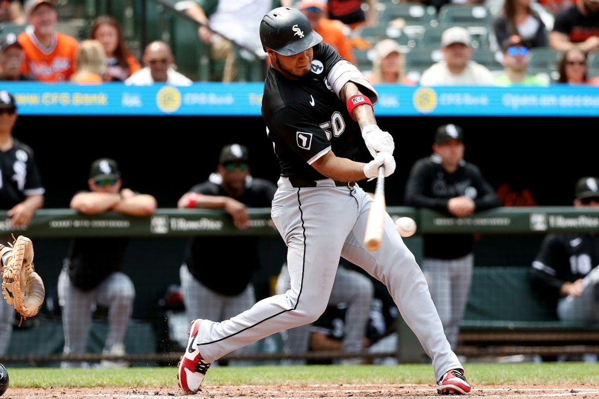 Jun 1, 2025; Baltimore, Maryland, USA; Chicago White Sox second baseman Lenyn Sosa (50) hits a single during the fourth inning against the Baltimore Orioles at Oriole Park at Camden Yards. Mandatory Credit: Daniel Kucin Jr.-Imagn Images