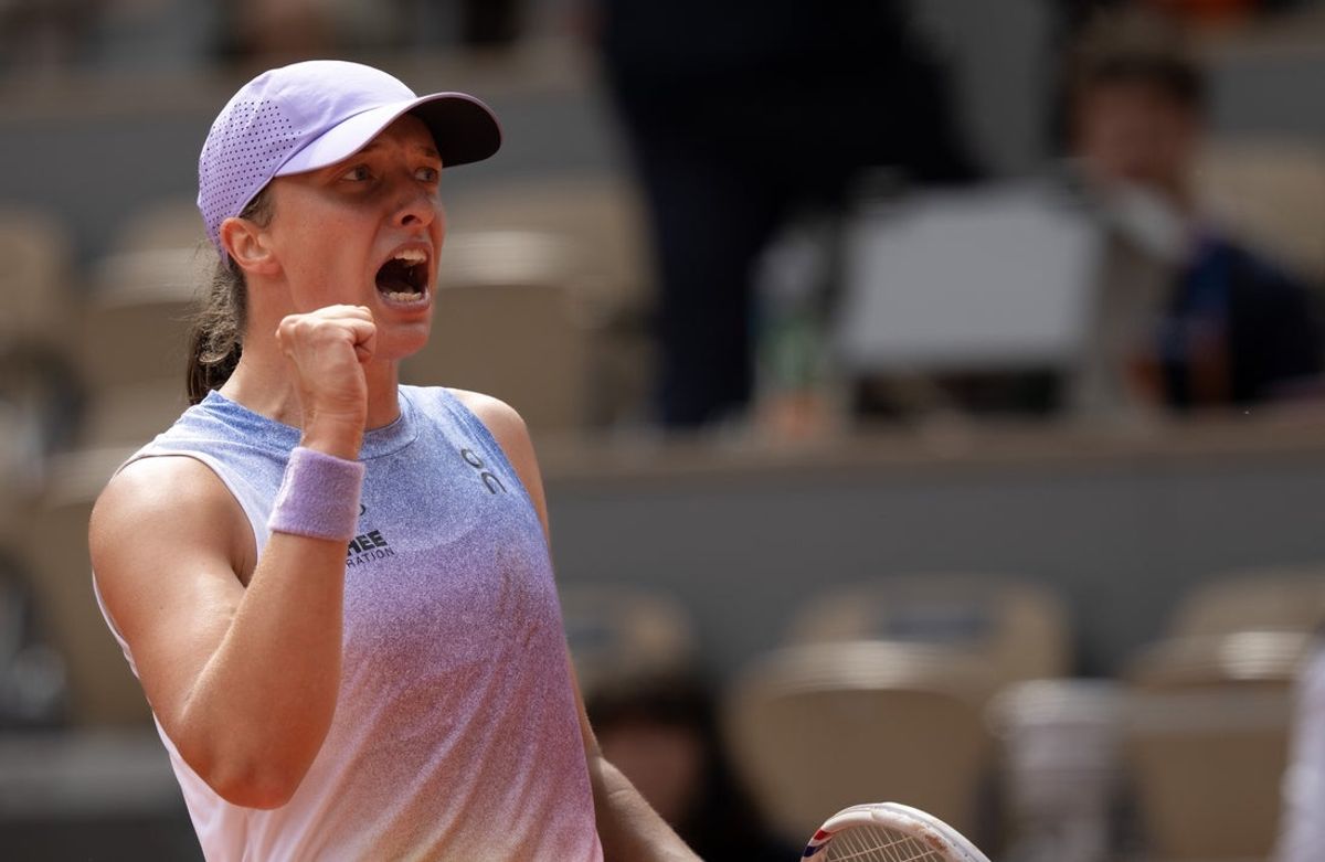 Jun 1, 2025; Paris, FR; Iga Swiatek of Poland celebrates winning her match against Elena Rybakina of Kazakhstan on day eight at Roland Garros Stadium. Mandatory Credit: Susan Mullane-Imagn Images