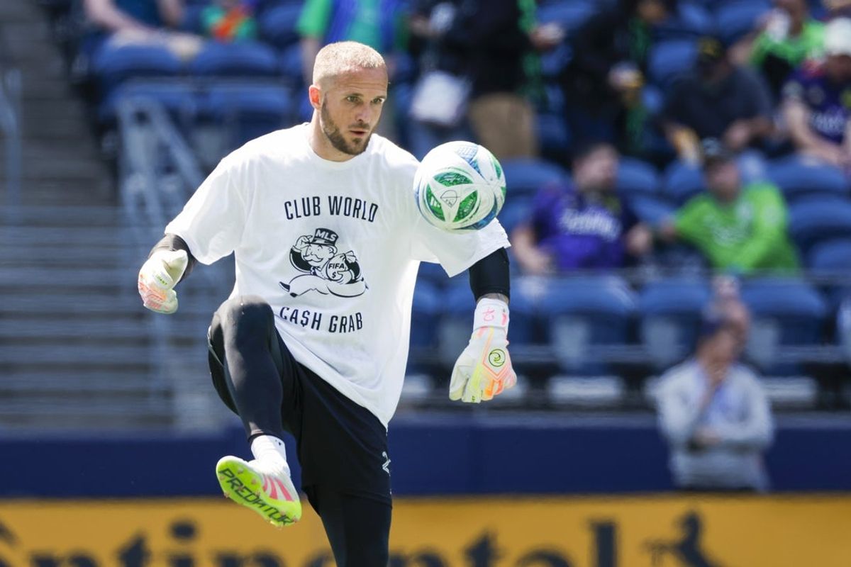 Jun 1, 2025; Seattle, Washington, USA; Seattle Sounders FC goalkeeper Stefan Frei (24) wears a t-shirt to protest FIFA Club World Cup bonus sharing from MLS while participating in pregame warmups against the Minnesota United at Lumen Field. Mandatory Credit: Joe Nicholson-Imagn Images