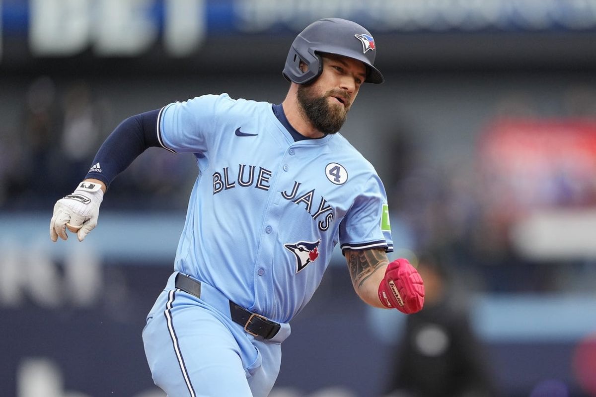 Jun 1, 2025; Toronto, Ontario, CAN; Toronto Blue Jays center fielder Nathan Lukes (38) heads for home plate to score against the Athletics during the eighth inning at Rogers Centre. Mandatory Credit: John E. Sokolowski-Imagn Images