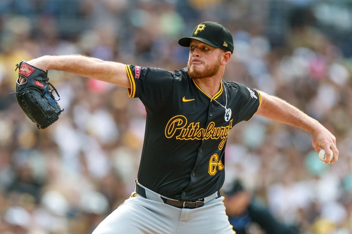 Jun 1, 2025; San Diego, California, USA; Pittsburgh Pirates relief pitcher Caleb Ferguson (64) throws a pitch during the seventh inning against the San Diego Padres at Petco Park. Mandatory Credit: David Frerker-Imagn Images
