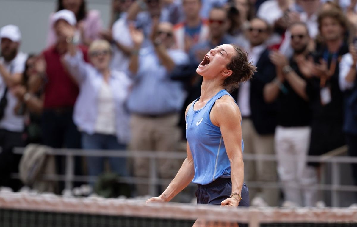Jun 2, 2025; Paris, FR; Lois Boisson of France celebrates winning her match against Jessica Pegula of the United States on day nine at Roland Garros Stadium.  Mandatory Credit: Susan Mullane-Imagn Images