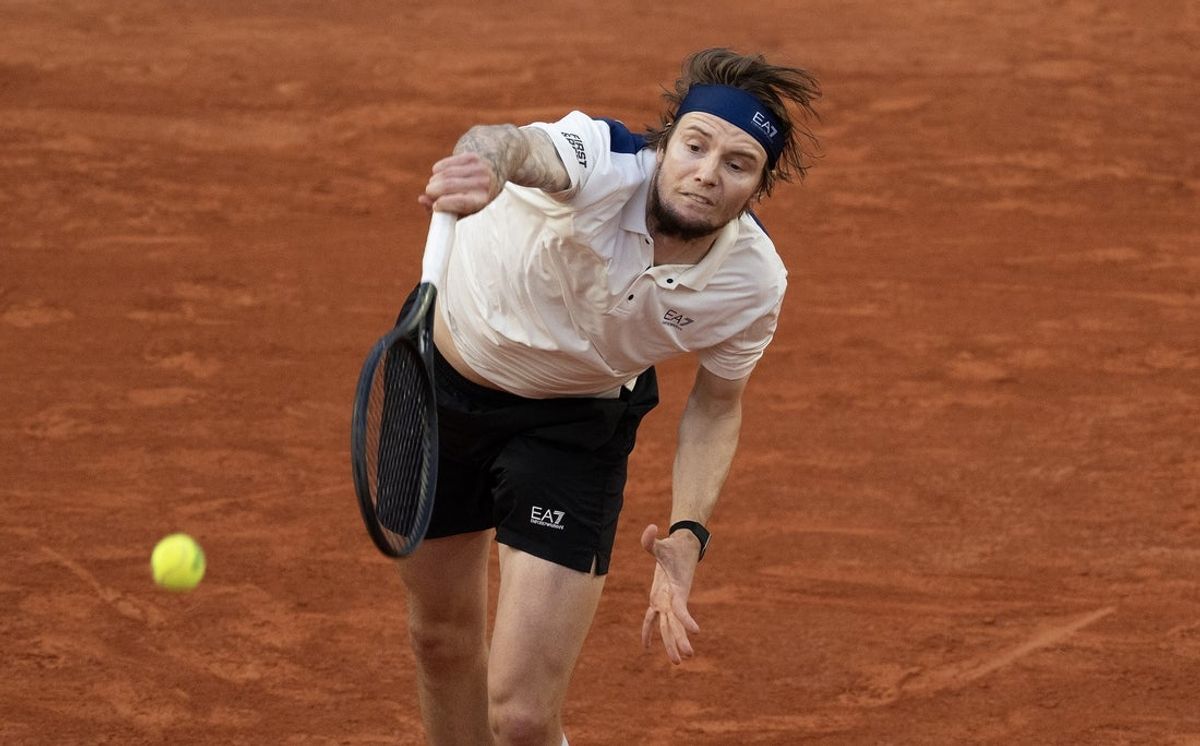 Jun 2, 2025; Paris, FR; Alexander Bublik of Kazakhstan serves the ball during his match against Jack Draper of Great Britain on day nine at Roland Garros Stadium.  Mandatory Credit: Susan Mullane-Imagn Images