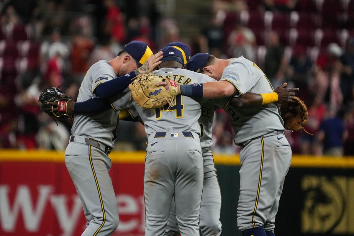The Brewers celebrate their 3-2 victory over the Reds at Great American Ball Park on Lou Gehrig's Day, Monday June 2, 2025.