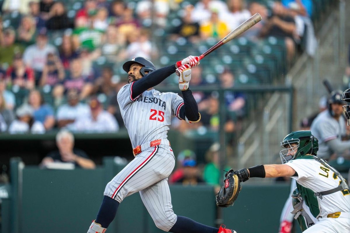 Jun 2, 2025; West Sacramento, California, USA; Minnesota Twins center fielder Byron Buxton (25) hits a two run RBI double against the Athletics during the second inning at Sutter Health Park. Mandatory Credit: Neville E. Guard-Imagn Images