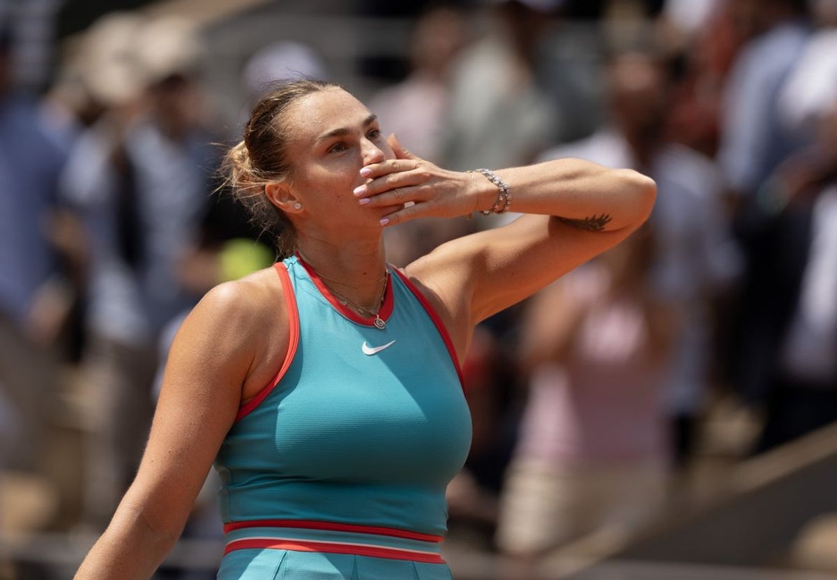 Jun 3, 2025; Paris, FR; Aryna Sabalenka celebrates winning her match against Qinwen Zheng  of China on day 10 at Roland Garros Stadium.  Mandatory Credit: Susan Mullane-Imagn Images