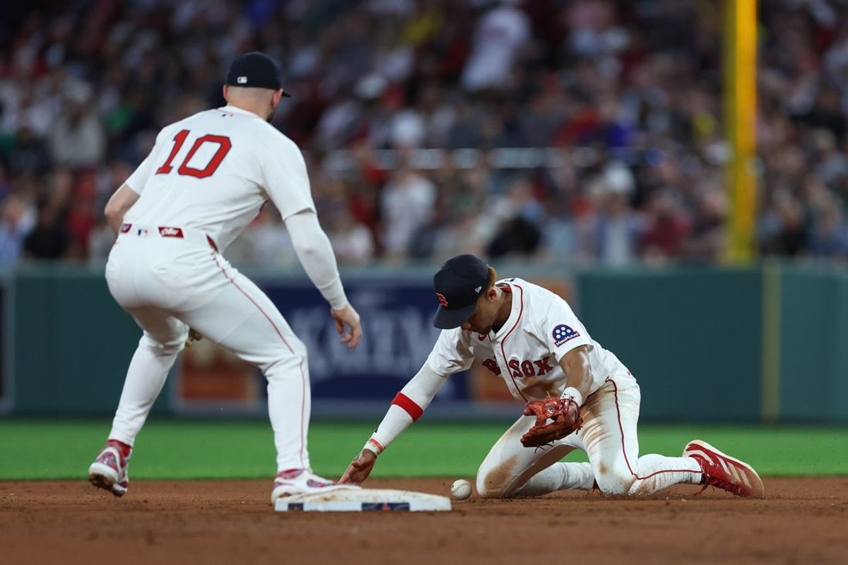 Jun 3, 2025; Boston, Massachusetts, USA; Boston Red Sox second baseman Kristian Campbell (28) attempts to field a ball during the fifth inning against the Los Angeles Angels at Fenway Park. Mandatory Credit: Paul Rutherford-Imagn Images