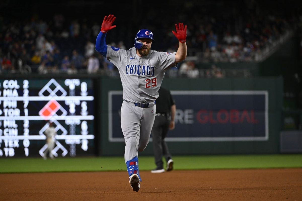 Jun 3, 2025; Washington, District of Columbia, USA; Chicago Cubs first baseman Michael Busch (29) reacts after hitting  a solo home run against the Washington Nationals during the seventh inning at Nationals Park. Mandatory Credit: Brad Mills-Imagn Images