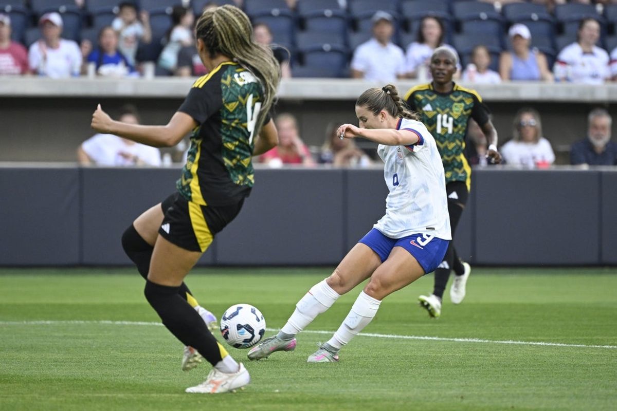 Jun 3, 2025; St. Louis, Missouri, USA; United States forward Ally Sentnor (9) drives the ball as Jamaica defender Chantelle Swaby (4) defends in the first half at Energizer Park. Mandatory Credit: Joe Puetz-Imagn Images