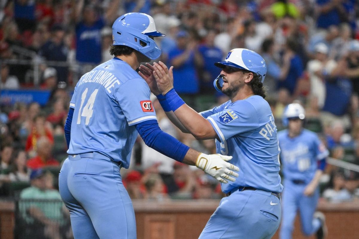 Jun 3, 2025; St. Louis, Missouri, USA;  Kansas City Royals first baseman Vinnie Pasquantino (9) is congratulated designated hitter Jac Caglianone (14) after he scored against the St. Louis Cardinals during the fifth inning at Busch Stadium. Mandatory Credit: Jeff Curry-Imagn Images