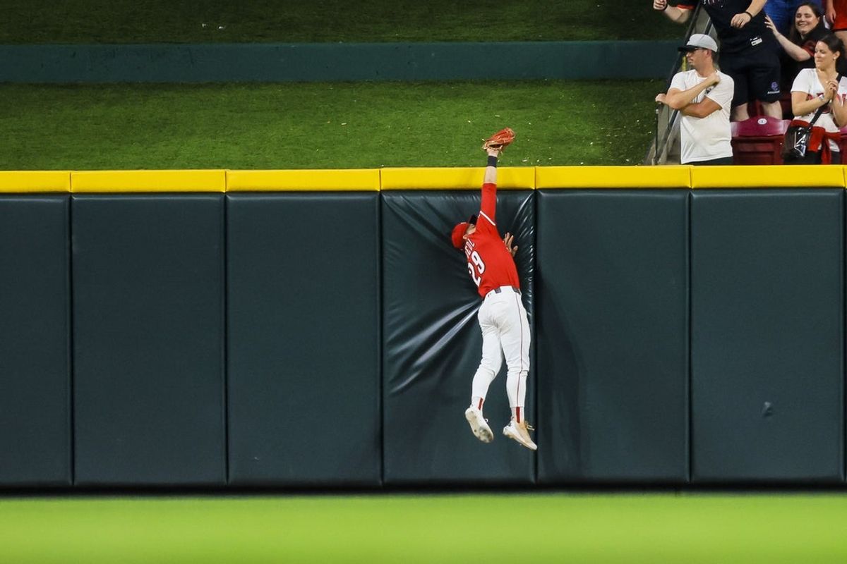 Jun 3, 2025; Cincinnati, Ohio, USA; Cincinnati Reds outfielder TJ Friedl (29) catches a fly out hit by Milwaukee Brewers pinch hitter Jake Bauers (not pictured) in the ninth inning at Great American Ball Park. Mandatory Credit: Katie Stratman-Imagn Images