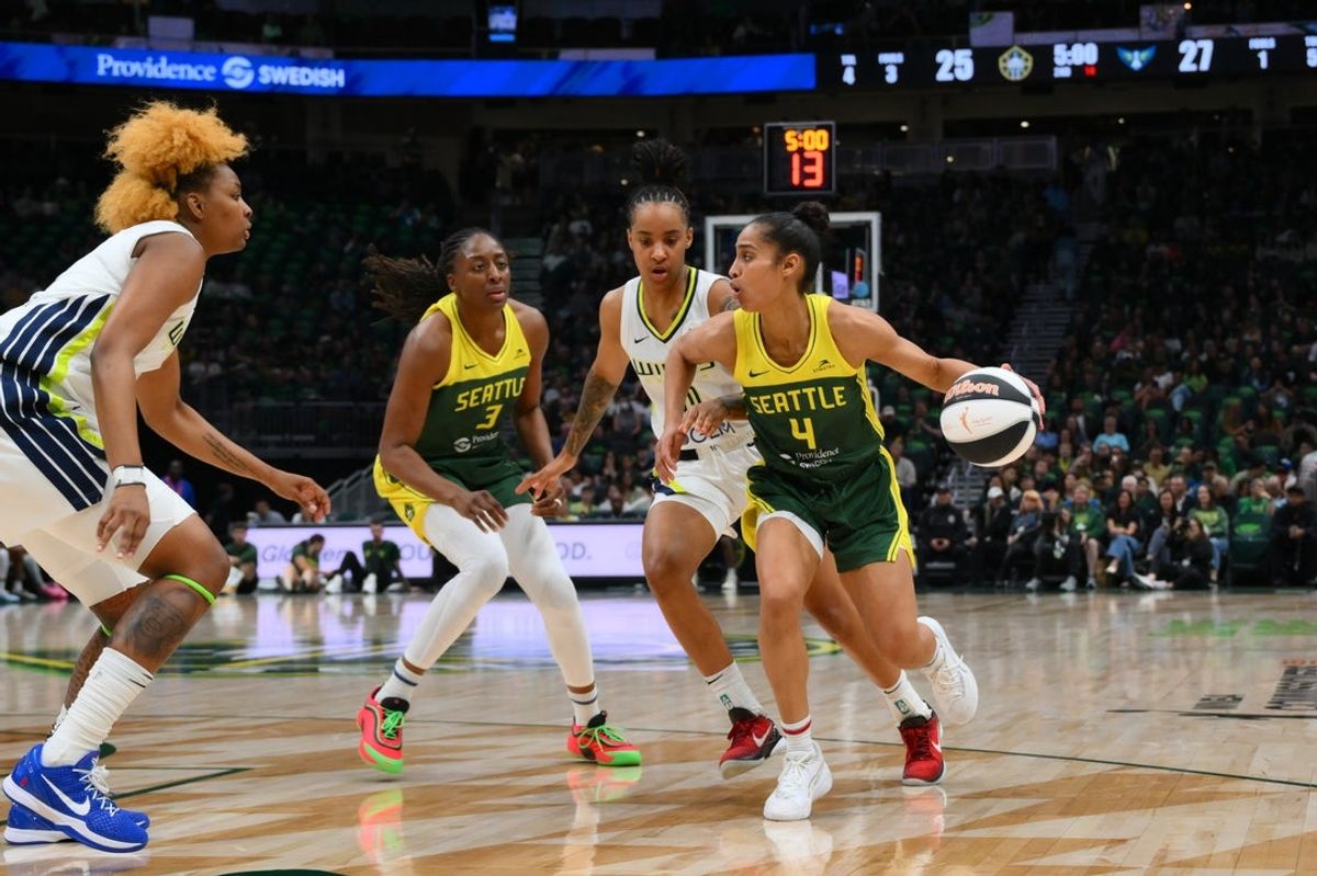 Jun 3, 2025; Seattle, Washington, USA; Seattle Storm guard Skylar Diggins (4) dribbles the ball while defended by Dallas Wings guard Aziaha James (10) during the first half at Climate Pledge Arena. Mandatory Credit: Steven Bisig-Imagn Images