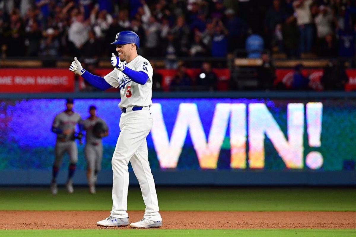 June 3, 2025; Los Angeles, California, USA; Los Angeles Dodgers first baseman Freddie Freeman (5) celebrates after hitting a walk off RBI double against the New York Mets during the tenth inning at Dodger Stadium. Mandatory Credit: Gary A. Vasquez-Imagn Images