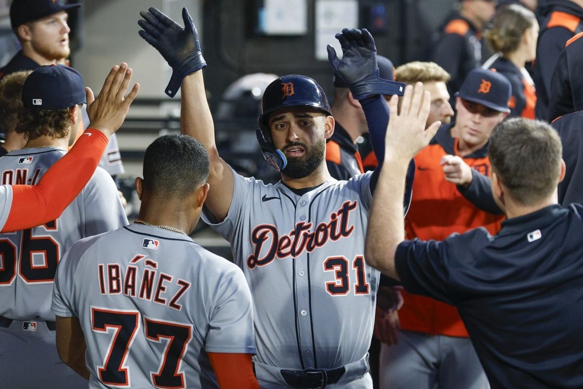 Jun 4, 2025; Chicago, Illinois, USA; Detroit Tigers left fielder Riley Greene (31) celebrates with teammates after scoring against the Chicago White Sox during the first inning at Rate Field. Mandatory Credit: Kamil Krzaczynski-Imagn Images