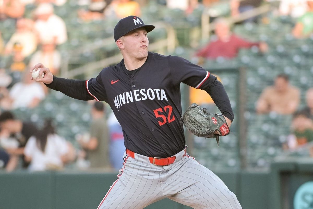 Jun 4, 2025; West Sacramento, California, USA; Minnesota Twins pitcher Zebby Matthews (52) throws a pitch against the Athletics during the first inning at Sutter Health Park. Mandatory Credit: Ed Szczepanski-Imagn Images