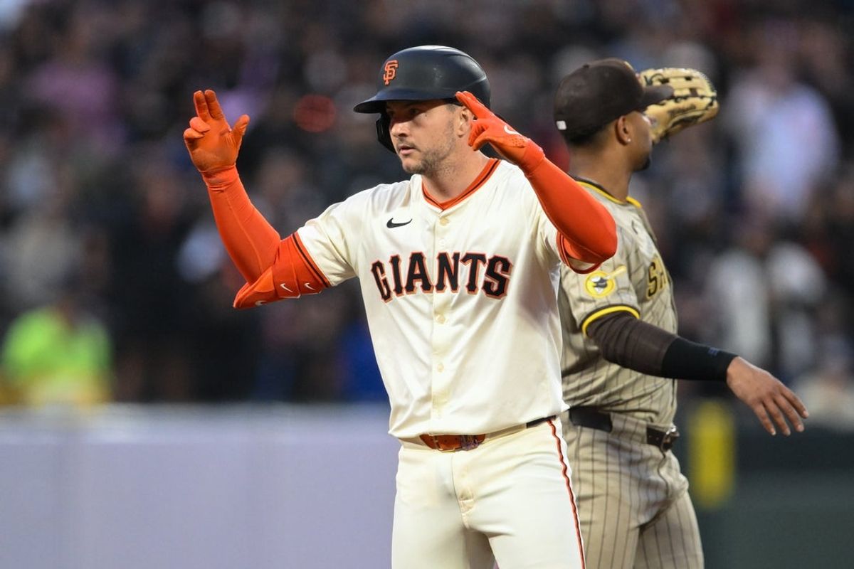 Jun 4, 2025; San Francisco, California, USA; San Francisco Giants catcher Patrick Bailey (14) celebrates his RBI double against the San Diego Padres in the fifth inning at Oracle Park. Mandatory Credit: Eakin Howard-Imagn Images