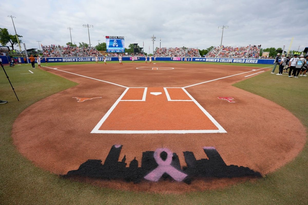 The skyline of Oklahoma City painted on the field is pictured before Game 1 of the Women's College World Series championship series between the Texas Longhorns at Texas Tech Red Raiders at Devon Park in Oklahoma City, Wednesday, June 4, 2025. Texas won 2-1.