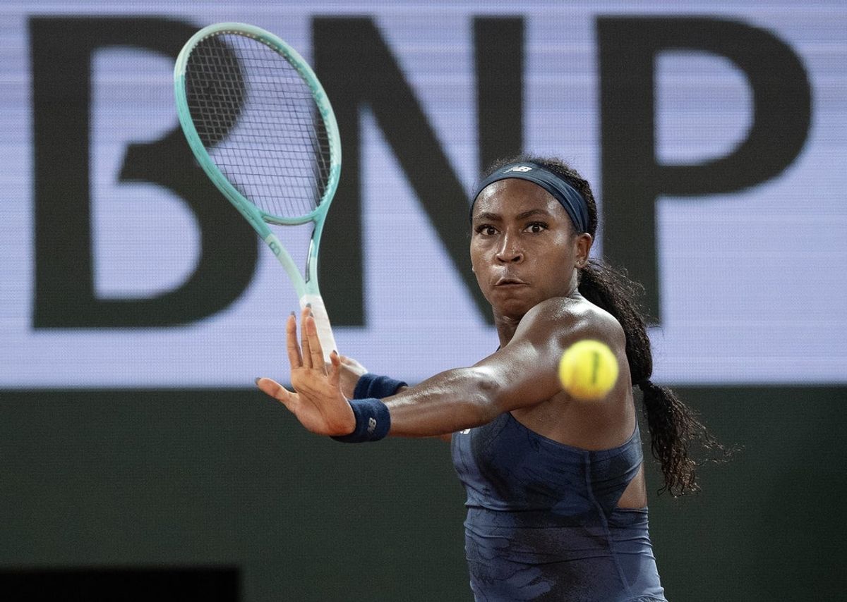 Jun 5, 2025; Paris, FR;  Coco Gauff of the United States returns a shot during her match against Lois Boisson of France on day 12 at Roland Garros Stadium. Mandatory Credit: Susan Mullane-Imagn Images