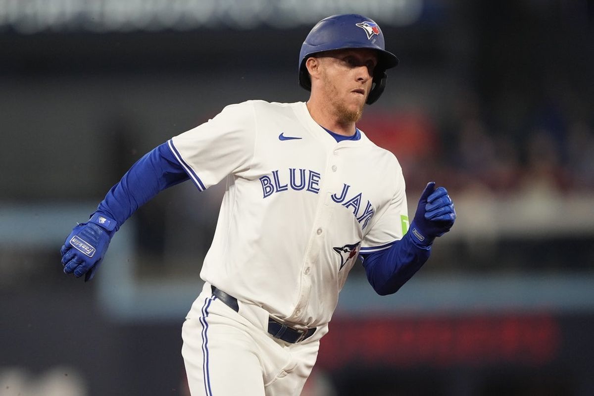 Jun 5, 2025; Toronto, Ontario, CAN; Toronto Blue Jays center fielder Myles Straw (3) runs to home to score on a double hit by catcher Tyler Heineman (not pictured) during the second inning against the Philadelphia Phillies at Rogers Centre. Mandatory Credit: John E. Sokolowski-Imagn Images