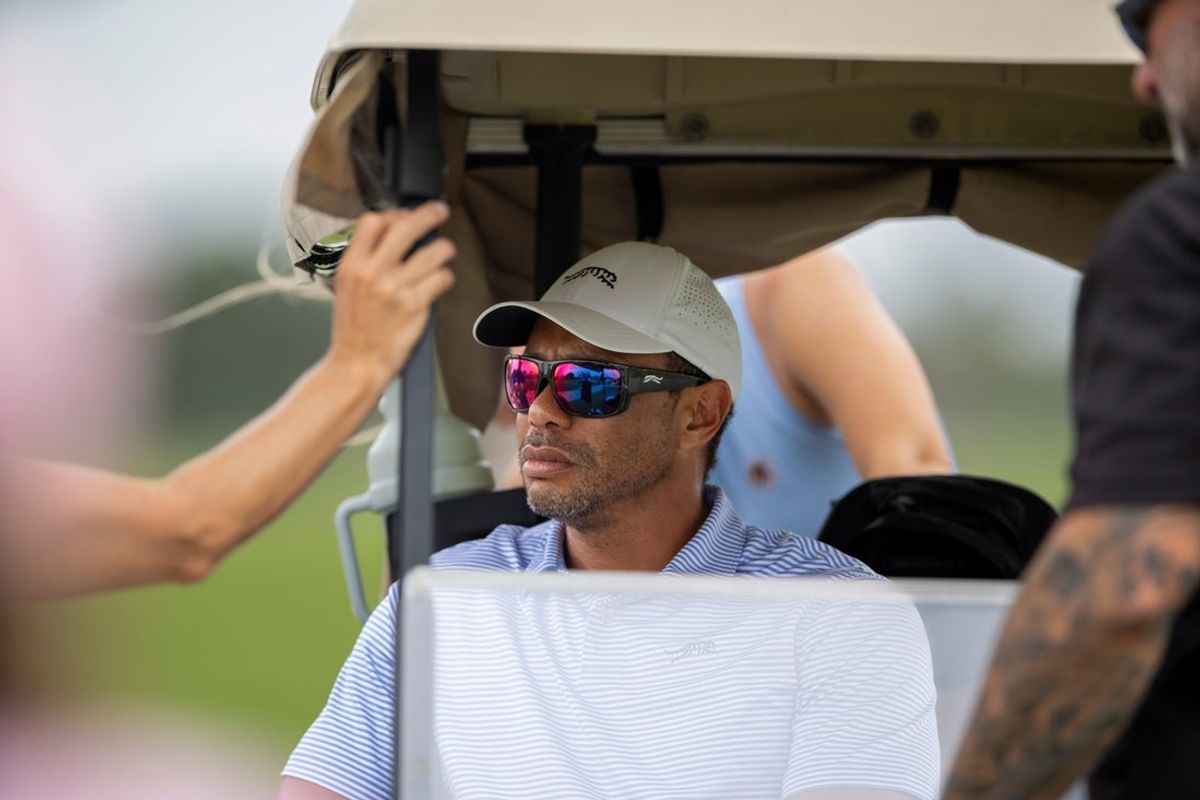 Tiger Woods watches his son, Charlie Woods play during the first round of the108th Amateur Championship at BallenIsles Country Club on June 5, 2025, in Palm Beach Gardens, Florida.