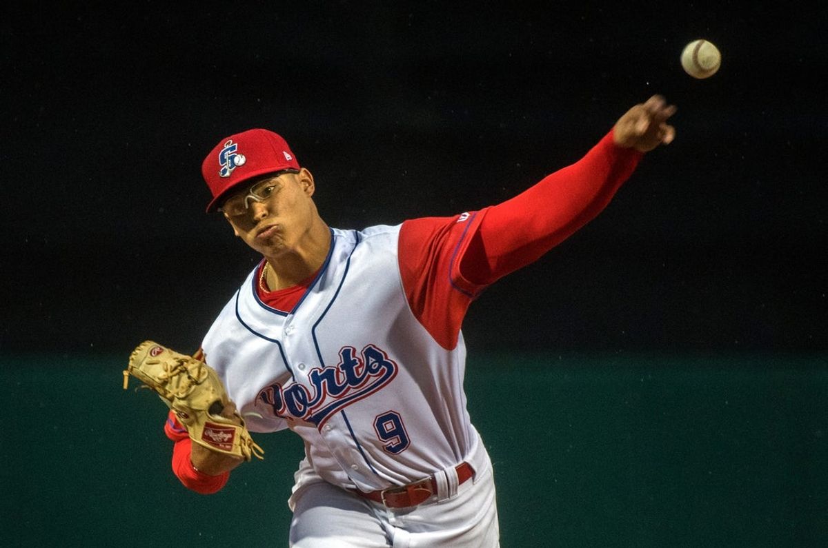 Stockton Ports' Jesus Luzardo delivers a pitch on the Ports' opening day against the Lake Elsinore Storm at the Stockton Ballpark in downtown Stockton on April. 5, 2018. A fast shutter speed of 1/1000th of a second stops the motion of Luzardo. 

Transmission Reference: REC1804060008402238 ORG XMIT: MER2018040600381823