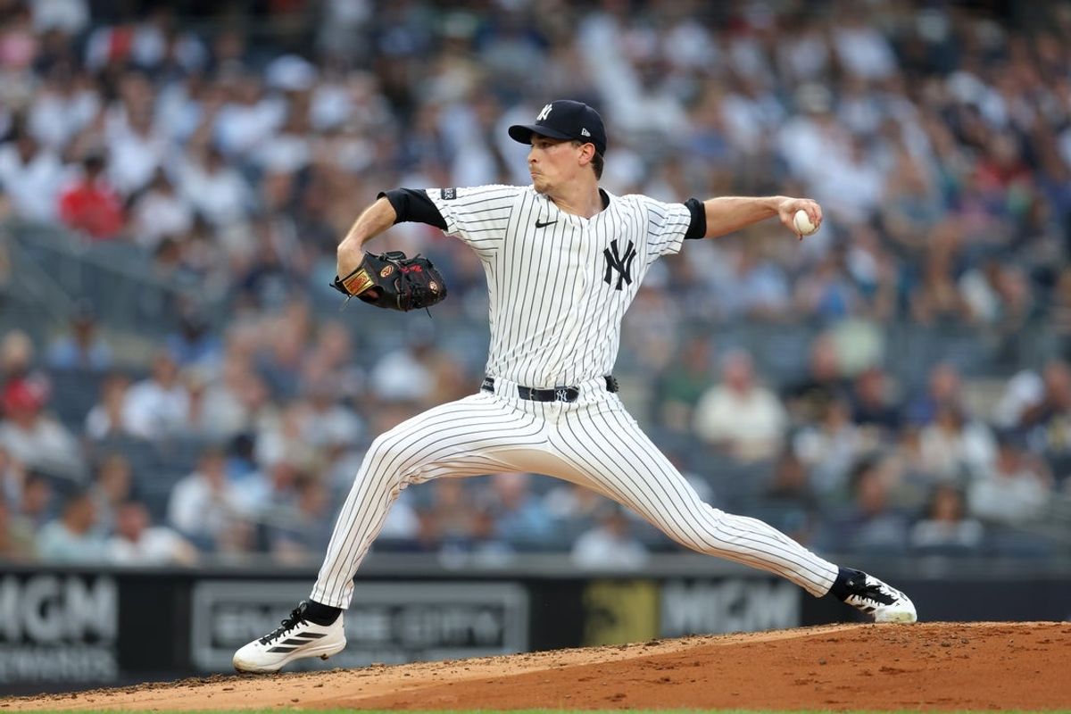 Jun 5, 2025; Bronx, New York, USA; New York Yankees starting pitcher Max Fried (54) pitches against the Cleveland Guardians during the second inning at Yankee Stadium. Mandatory Credit: Brad Penner-Imagn Images