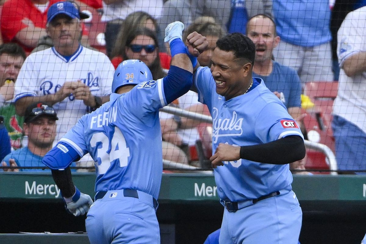 Jun 5, 2025; St. Louis, Missouri, USA;  Kansas City Royals catcher Freddy Fermin (34) is congratulated by first baseman Salvador Perez (13) after hitting a solo home run against the St. Louis Cardinals during the third inning at Busch Stadium. Mandatory Credit: Jeff Curry-Imagn Images