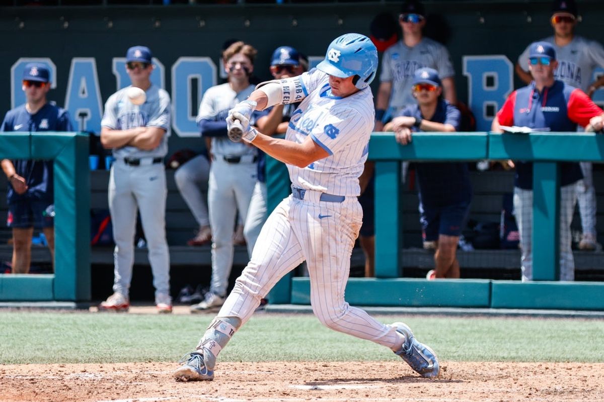 Jun 6, 2025; Chapel Hill, NC, USA;  North Carolina catcher Luke Stevenson (44) hits the ball during the seventh inning of the Super Regionals game against Arizona in Chapel Hill, North Carolina. Mandatory Credit: Jaylynn Nash-Imagn Images