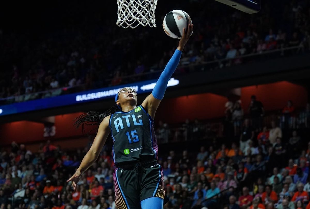 Jun 6, 2025; Uncasville, Connecticut, USA; Atlanta Dream guard Allisha Gray (15) drives the ball to the basket against the Connecticut Sun in the first half at Mohegan Sun Arena. Mandatory Credit: David Butler II-Imagn Images