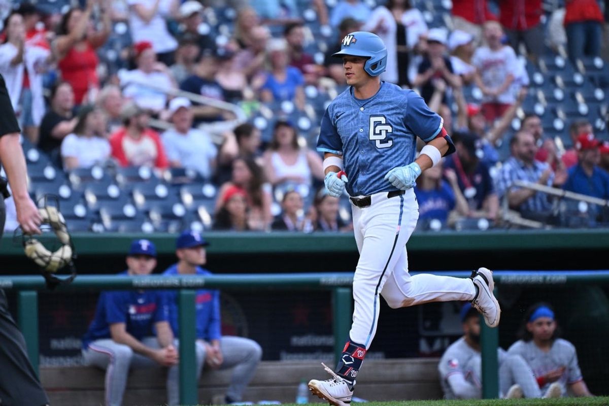 Jun 6, 2025; Washington, District of Columbia, USA; Washington Nationals right fielder Alex Call (17) jogs to home plate to score a run after hitting a home run during the seventh inning against the Texas Rangers at Nationals Park. Mandatory Credit: Rafael Suanes-Imagn Images