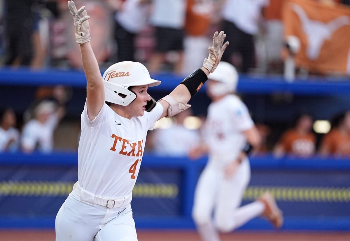 Texas' Leighann Goode (43) celebrates a home run in the first inning during the Women's College World Series championship game between Texas Tech and Texas at Devon Park, Friday, June, 6, 2025, in Oklahoma City.