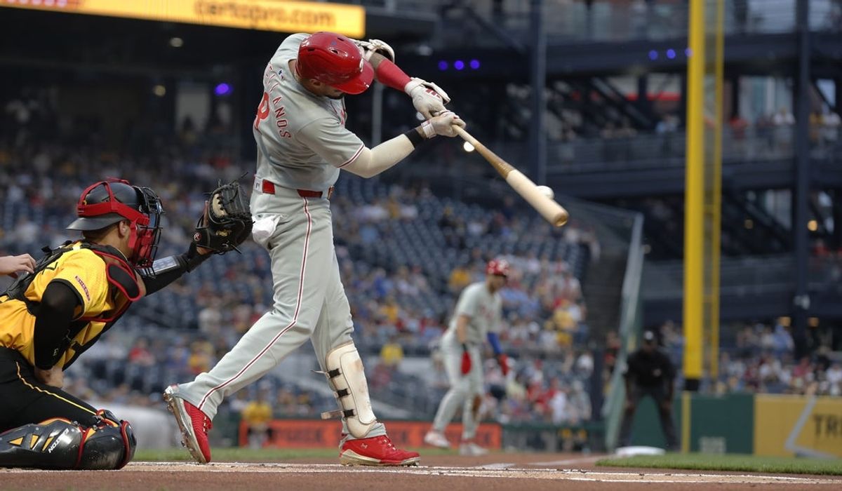 Jun 6, 2025; Pittsburgh, Pennsylvania, USA;  Philadelphia Phillies outfielder Nick Castellanos (8) drives in a run against the Pittsburgh Pirates during the first inning at PNC Park. Mandatory Credit: Charles LeClaire-Imagn Images
