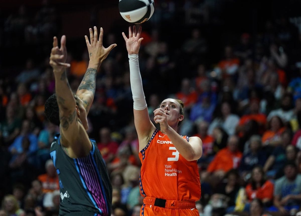 Jun 6, 2025; Uncasville, Connecticut, USA; Connecticut Sun guard Marina Mabrey (3) shoots the ball against Atlanta Dream center Brittney Griner (42) in the second half at Mohegan Sun Arena. Mandatory Credit: David Butler II-Imagn Images