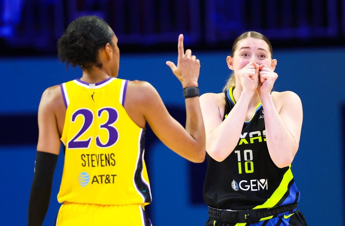 Jun 6, 2025; Arlington, Texas, USA; Dallas Wings center Luisa Geiselsoder (18) and Los Angeles Sparks forward Azura Stevens (23) react during the second half at College Park Center. Mandatory Credit: Kevin Jairaj-Imagn Images