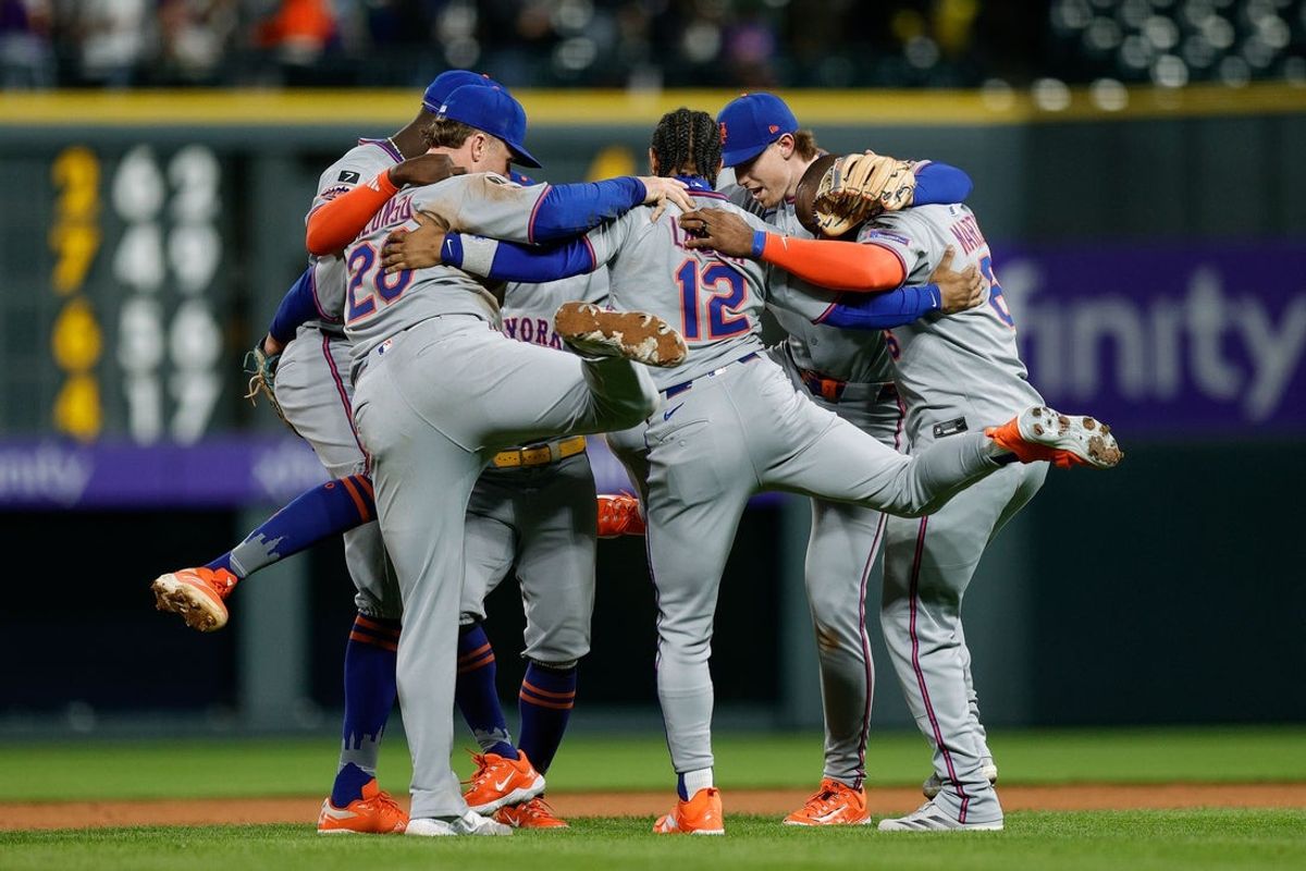 Jun 6, 2025; Denver, Colorado, USA; New York Mets shortstop Ronny Mauricio (10) and first baseman Pete Alonso (20) and pinch hitter Francisco Lindor (12) and designated hitter Starling Marte (6) and third baseman Brett Baty (7) celebrate after the game against the Colorado Rockies at Coors Field. Mandatory Credit: Isaiah J. Downing-Imagn Images