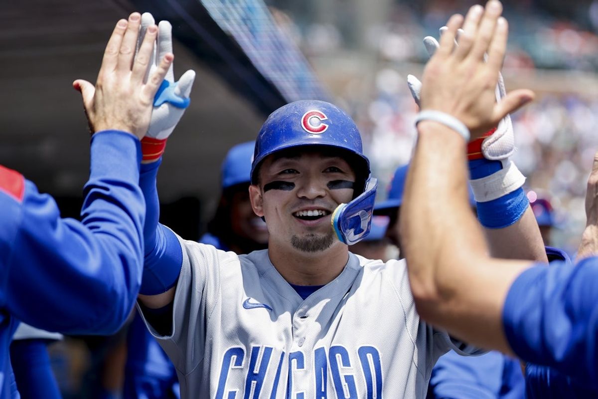 Jun 7, 2025; Detroit, Michigan, USA;  Chicago Cubs outfielder Seiya Suzuki (27) celebrates after hitting a home run in the first inning against the Detroit Tigers at Comerica Park. Mandatory Credit: Rick Osentoski-Imagn Images