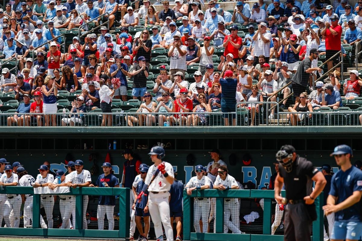 Jun 7, 2025; Chapel Hill, NC, USA; Arizona fans celebrate during the third inning of the Super Regionals game against North Carolina in Chapel Hill, North Carolina. Mandatory Credit: Jaylynn Nash-Imagn Images