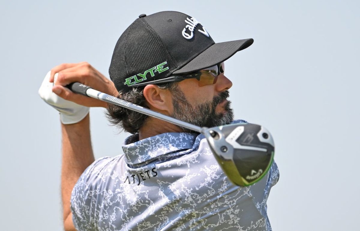 Jun 7, 2025; Caledon, Ontario, CAN;  Adam Hadwin Hits his tee shot at the ninth hole during the third round of the RBC Canadian Open golf tournament. Mandatory Credit: Dan Hamilton-Imagn Images