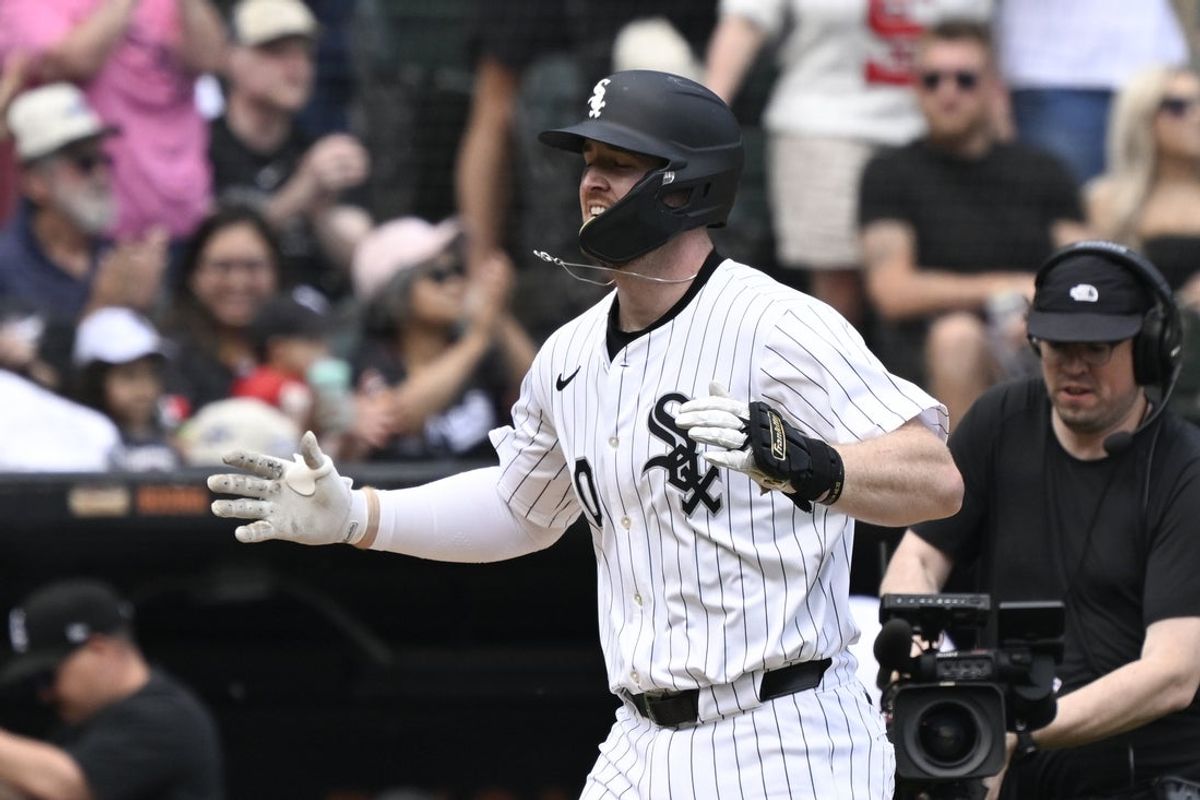 Jun 7, 2025; Chicago, Illinois, USA;  Chicago White Sox first baseman Tim Elko (30) claps after he hit a two run home run during the second inning against the Kansas City Royals at Rate Field. Mandatory Credit: Matt Marton-Imagn Images
