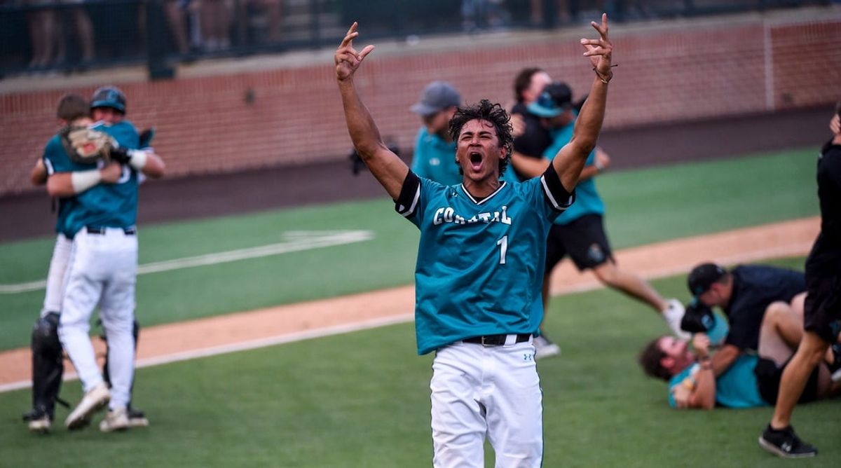 Coastal Carolina Chanticleers' Sebastian Alexander (1) celebrates the win over Auburn in game two of the NCAA Baseball Super Regonal at Plainsman Park in Auburn, Ala., on Friday June 6, 2025.