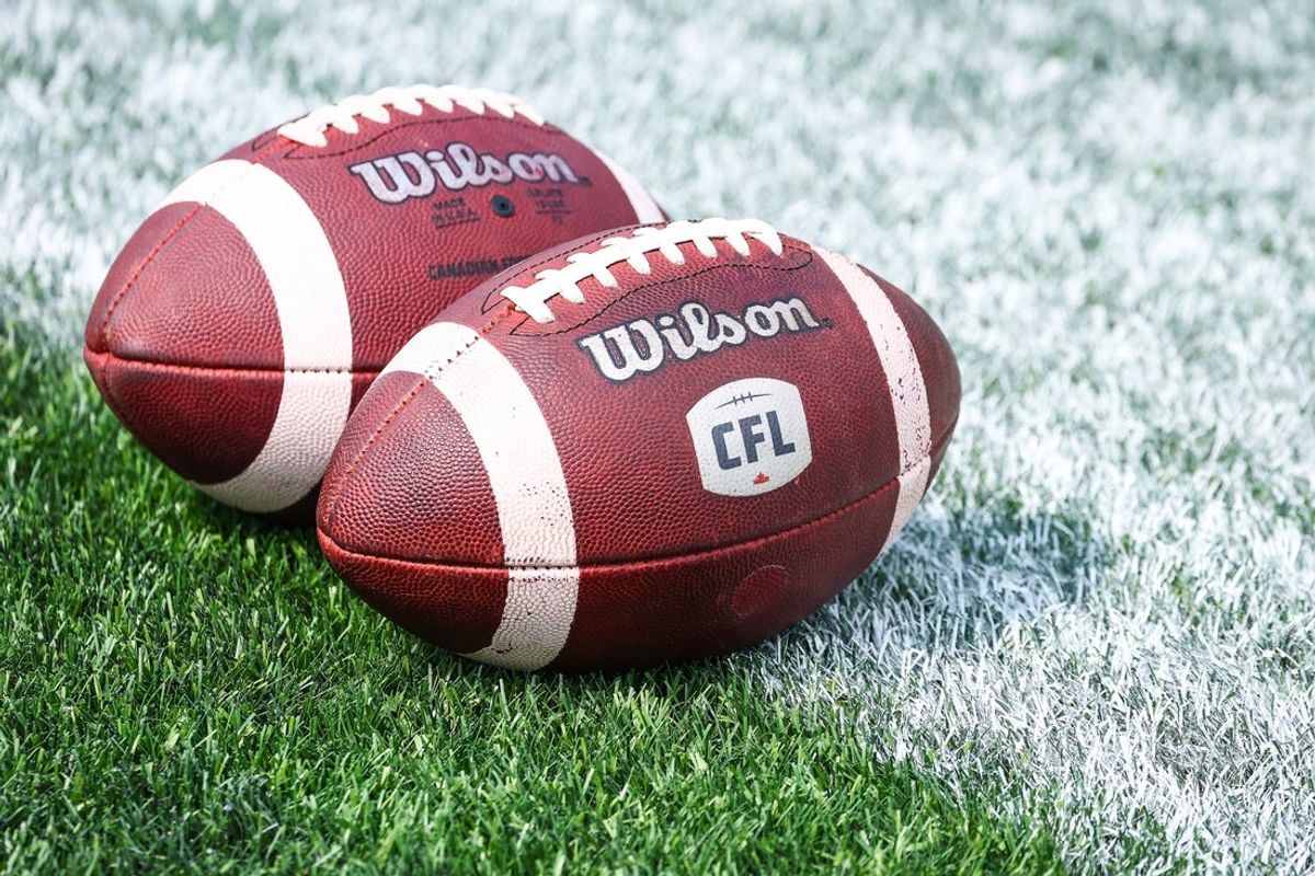 Jun 7, 2025; Calgary, Alberta, Canada; General view of the balls on the sideline prior to the game between the Calgary Stampeders and the Hamilton Tiger-Cats at McMahon Stadium. Mandatory Credit: Sergei Belski-Imagn Images
