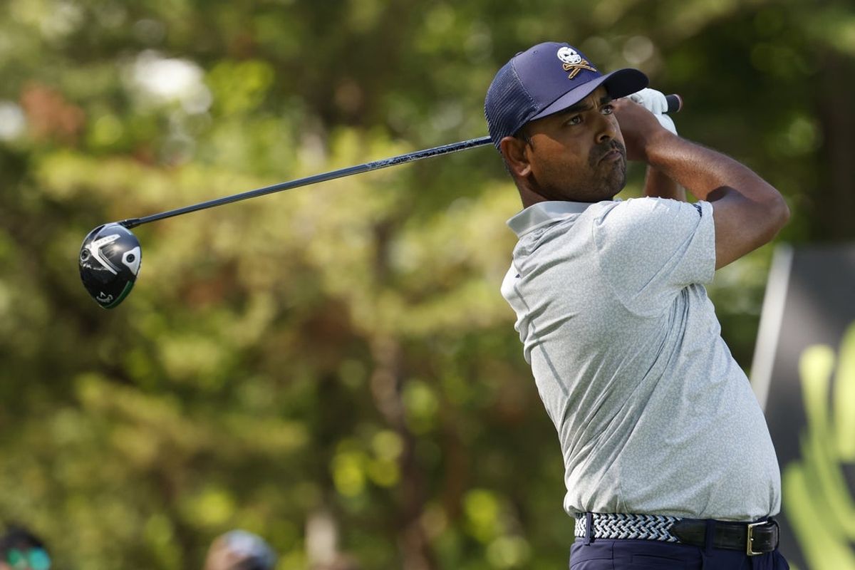 Jun 7, 2025; Gainesville, Virginia, USA; Anirban Lahiri of team Crushers GC hits a tee shot on the fifteenth hole during the second round of the LIV Golf Virginia golf tournament at Robert Trent Jones Golf Club. Mandatory Credit: Geoff Burke-Imagn Images
