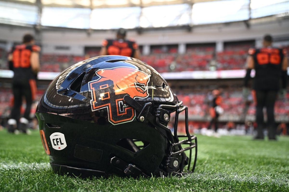 Jun 7, 2025; Vancouver, British Columbia, Canada;  Detailed view of a BC Lions helmet on the field as warm up takes place between BC Lions andEdmonton Elks at BC Place Stadium. Mandatory Credit: Anne-Marie Sorvin-Imagn Images