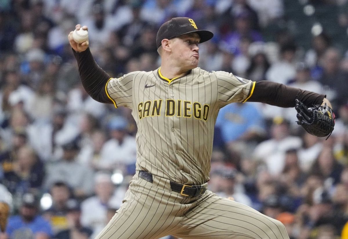 Jun 7, 2025; Milwaukee, Wisconsin, USA; San Diego Padres pitcher Stephen Kolek (32) delivers a pitch against the Milwaukee Brewers in the sixth inning  at American Family Field. Mandatory Credit: Michael McLoone-Imagn Images