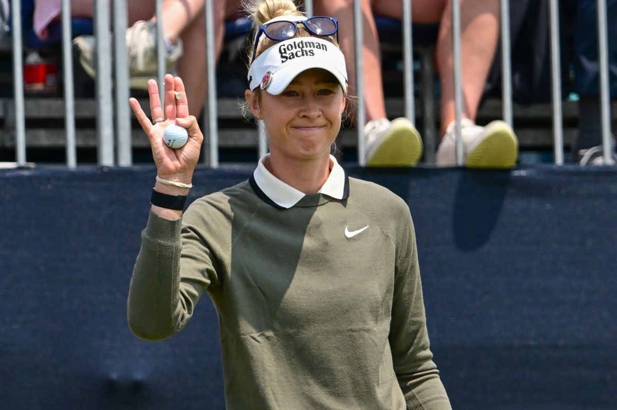 Jun 1, 2025; Erin, Wisconsin, USA; Nelly Korda waves to fans during the final round of the U.S. Women's Open golf tournament. Mandatory Credit: Benny Sieu-Imagn Images