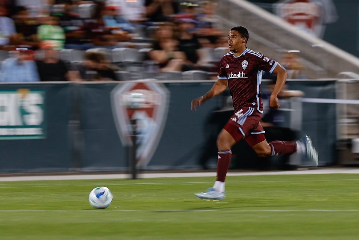 Jun 7, 2025; Commerce City, Colorado, USA; Colorado Rapids defender Reggie Cannon (4) controls the ball in the second half against the Austin FC at Dick's Sporting Goods Park. Mandatory Credit: Isaiah J. Downing-Imagn Images