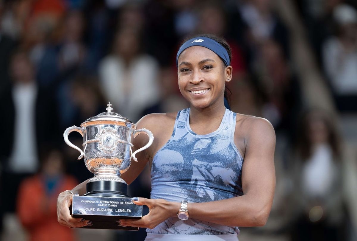 Jun 7, 2025; Paris, FR;  Coco Gauff of the United States poses with the trophy after winning the womenís singles final against Aryna Sabalenka on day 14 at Roland Garros Stadium. Mandatory Credit: Susan Mullane-Imagn Images